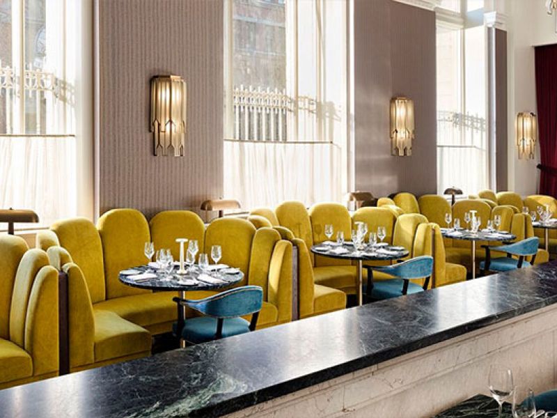 circular booth seating in green velvet